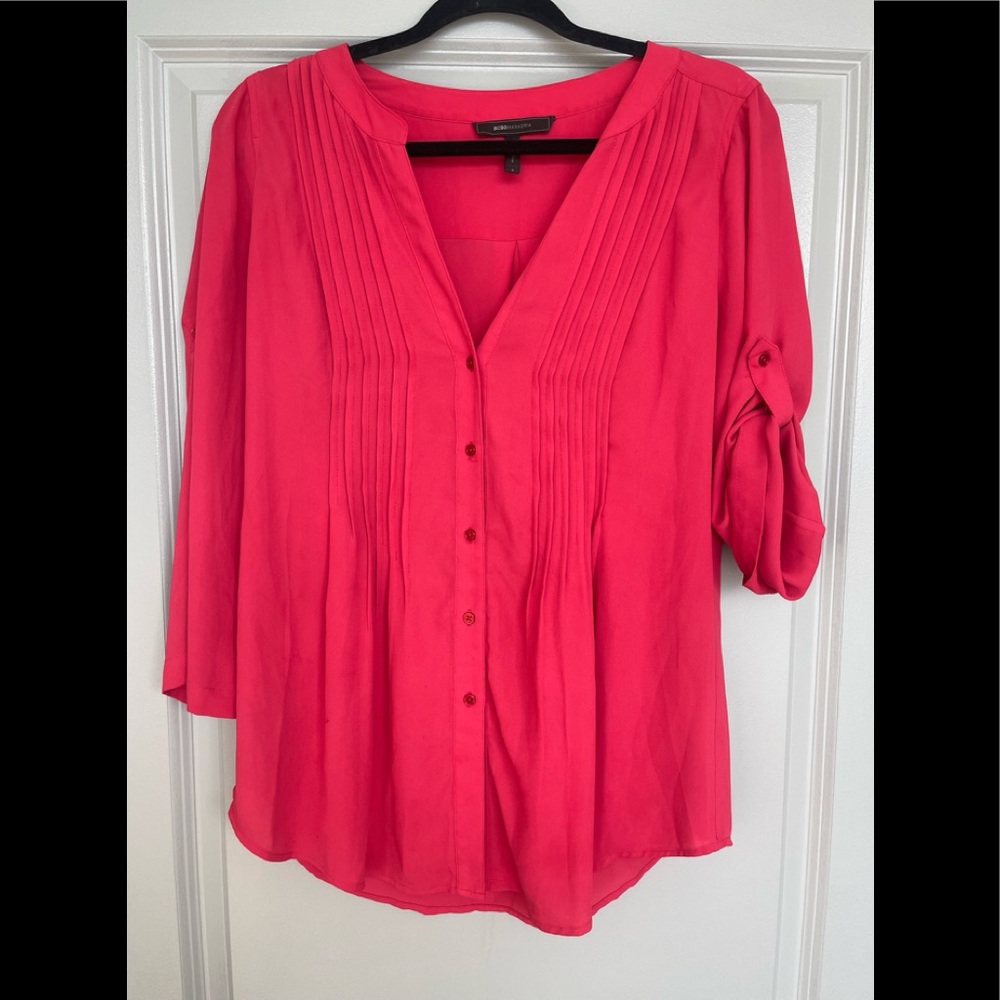 BCBGMaxAzria blouse. Sleeves can be worn down or buttoned to shorten. Like new!